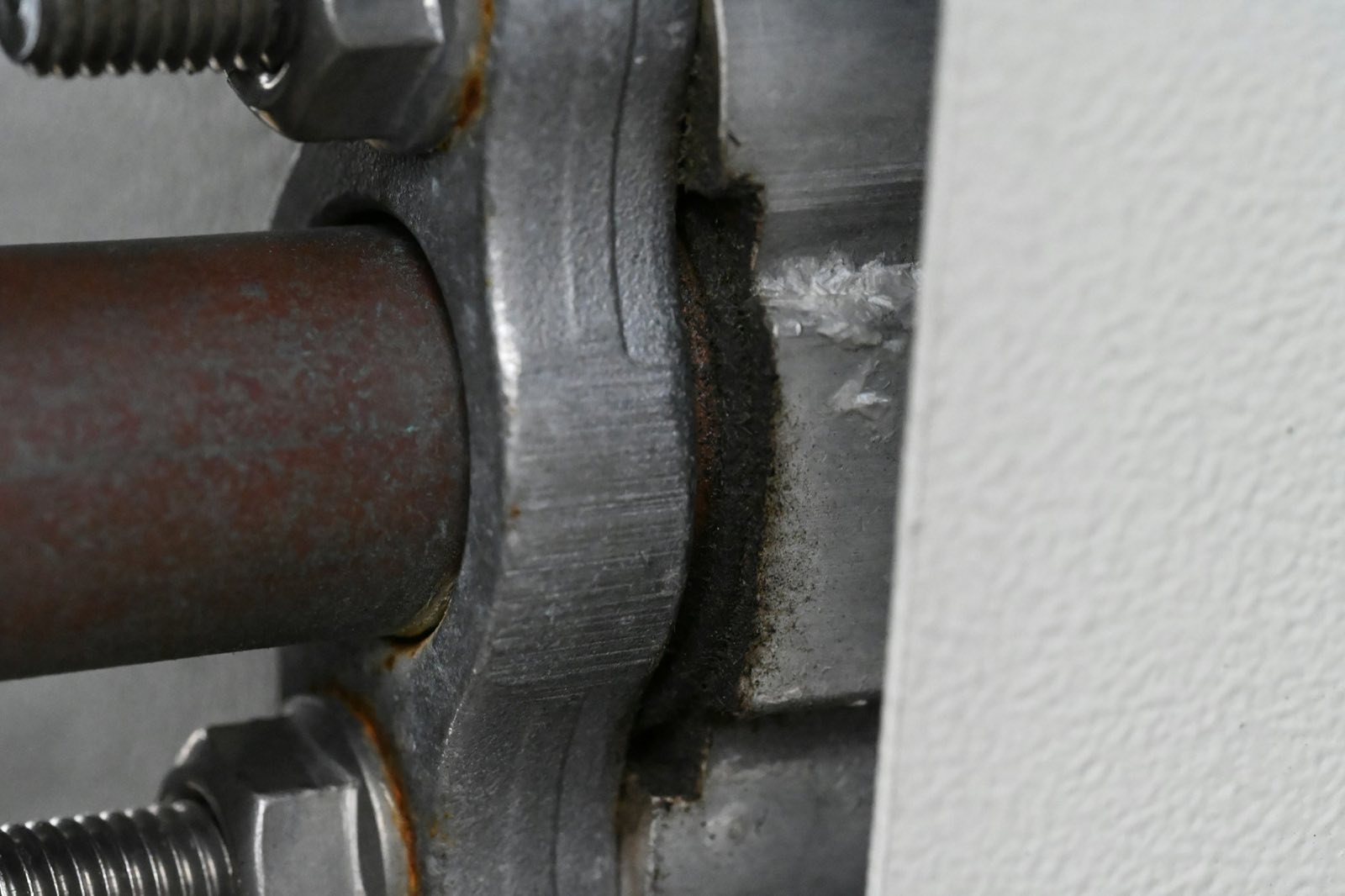Close-up of a bolted pipe fitting joint